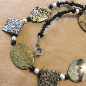 Stone, glass, and metal necklace